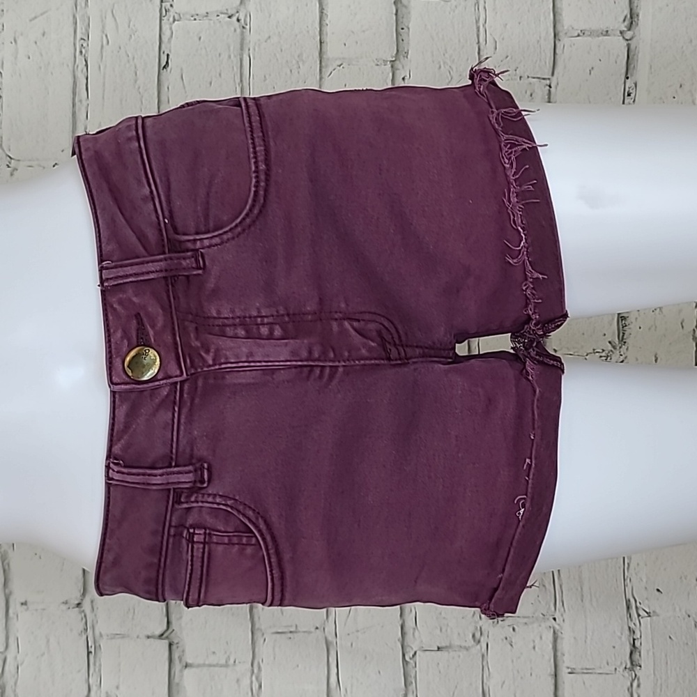 AE Next Level Low Rise Cuffed Raw Hem Cotton Denim Shortie Shorts in Burgundy
